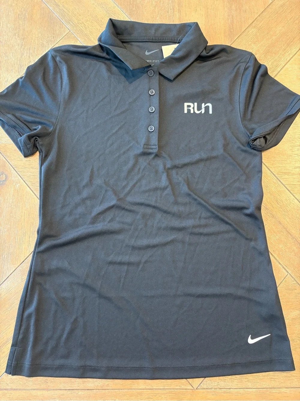 Nike women's Black polo shirt 
